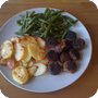 Thumb of Panierte Champignons mit Kartoffelschnitzen und Bohnen