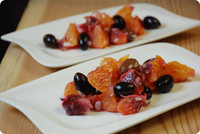 <a href="/recipes/658"><img alt="Titelsschrift" src="/system/rectitles/CAPS_Pikanter.png?1427023009" /><img alt="Titelsschrift" src="/system/rectitles/Orangensalat.png?1427023009" /><img alt="Titelsschrift" src="/system/rectitles/mit.png?1261750185" /><img alt="Titelsschrift" src="/system/rectitles/Oliven.png?1427023009" /></a>